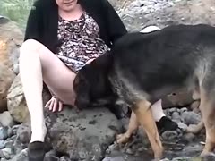 Her dog licked the mature blonde.